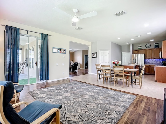 5830 100th Ave E, Parrish, FL 34219 - dining room featuring a ceiling fan, light wood-style floors, and recessed lighting