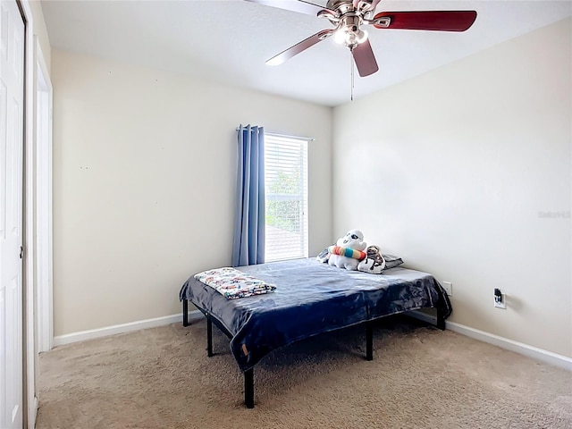 5830 100th Ave E, Parrish, FL 34219 - carpeted bedroom featuring baseboards and ceiling fan