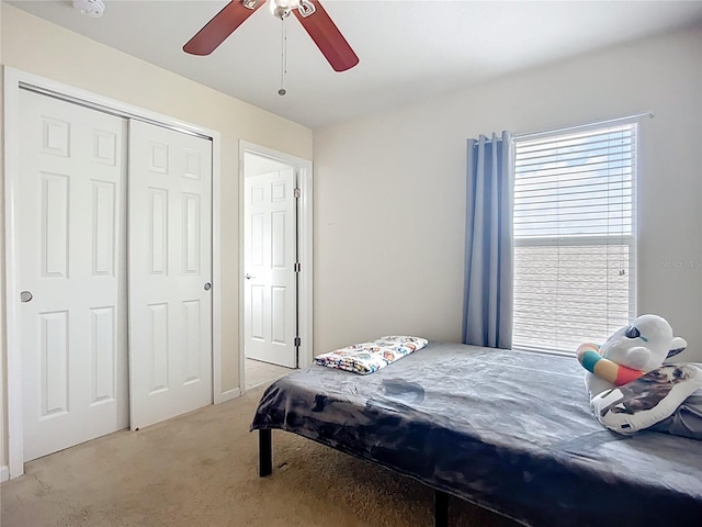 5830 100th Ave E, Parrish, FL 34219 - bedroom with light carpet, a closet, and ceiling fan