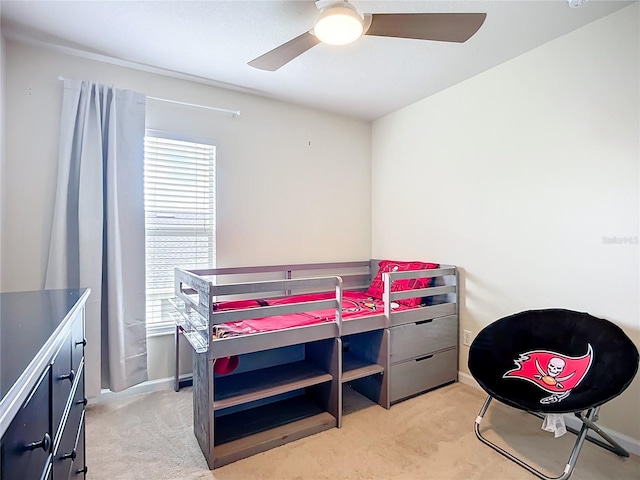5830 100th Ave E, Parrish, FL 34219 - bedroom with light colored carpet and a ceiling fan