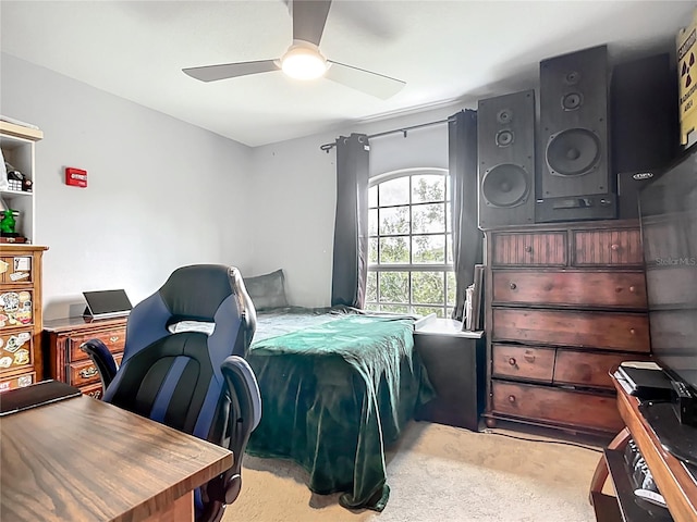 5830 100th Ave E, Parrish, FL 34219 - bedroom with light colored carpet, a desk, and a ceiling fan