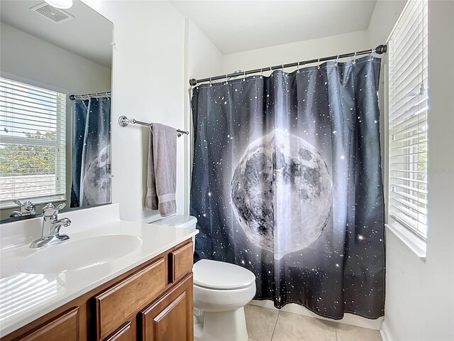 5830 100th Ave E, Parrish, FL 34219 - full bathroom with vanity, tile patterned floors, and a shower with shower curtain