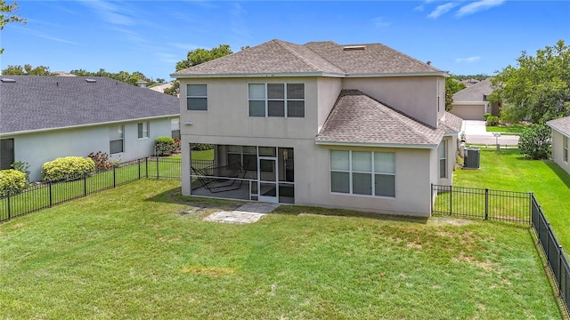 5830 100th Ave E, Parrish, FL 34219 - back of house featuring roof with shingles, stucco siding, a sunroom, and a fenced backyard