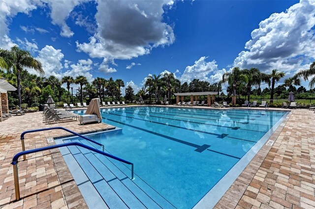 5830 100th Ave E, Parrish, FL 34219 - community pool with a patio