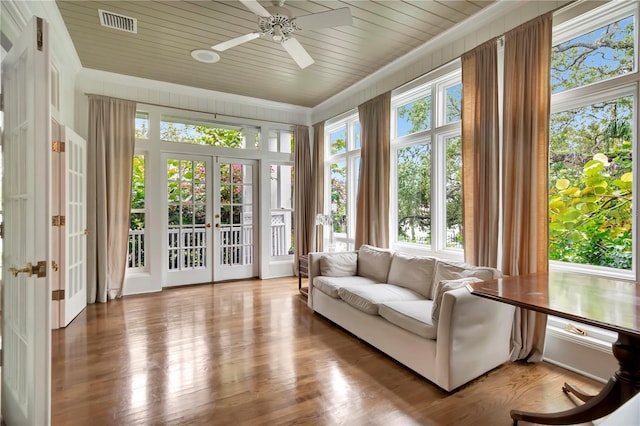 6220 Bayshore Blvd, Tampa, FL 33611 - sunroom / solarium with french doors, crown molding, wooden ceiling, and wood finished floors