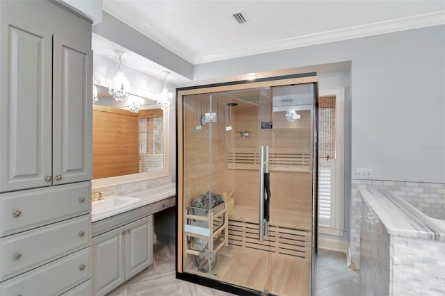 6220 Bayshore Blvd, Tampa, FL 33611 - full bath featuring vanity, a chandelier, ornamental molding, and a stall shower