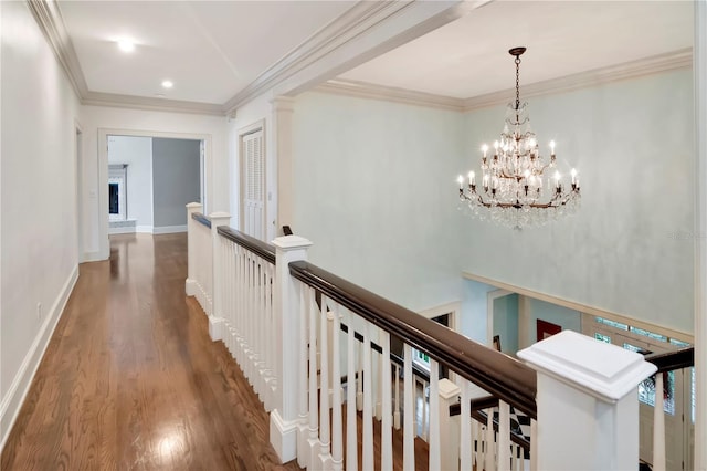 6220 Bayshore Blvd, Tampa, FL 33611 - corridor featuring an upstairs landing, wood finished floors, ornamental molding, a chandelier, and recessed lighting