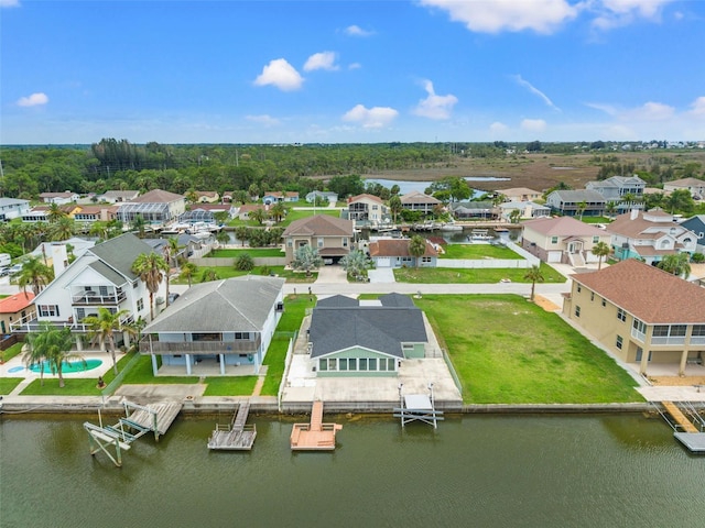 7401 Islander Ln, Hudson, FL 34667 - aerial perspective of suburban area with a nearby body of water