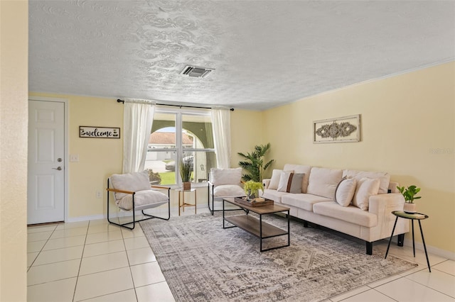7401 Islander Ln, Hudson, FL 34667 - living area with tile patterned floors and a textured ceiling