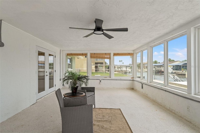 7401 Islander Ln, Hudson, FL 34667 - unfurnished sunroom with french doors and a ceiling fan