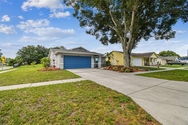 4108 Woodtrail Blvd, New Port Richey, FL 34653 - ranch-style home with an attached garage, concrete driveway, stucco siding, and a front yard