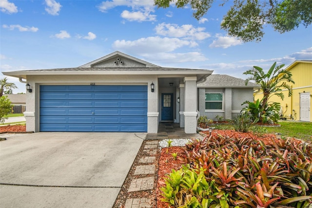 4108 Woodtrail Blvd, New Port Richey, FL 34653 - view of front facade featuring stucco siding, concrete driveway, an attached garage, and roof with shingles