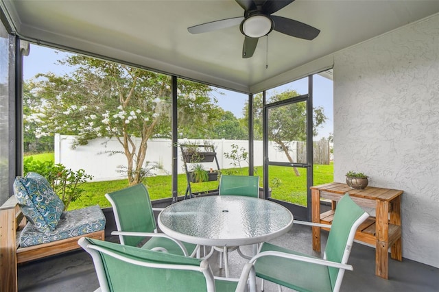 4108 Woodtrail Blvd, New Port Richey, FL 34653 - sunroom / solarium featuring ceiling fan and outdoor dining area