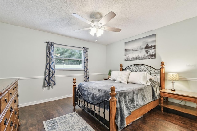 4108 Woodtrail Blvd, New Port Richey, FL 34653 - bedroom featuring a textured ceiling, wood finished floors, and ceiling fan
