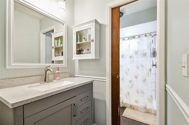 4108 Woodtrail Blvd, New Port Richey, FL 34653 - bathroom with vanity and curtained shower