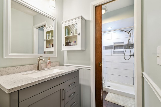 4108 Woodtrail Blvd, New Port Richey, FL 34653 - bathroom featuring vanity and a shower stall