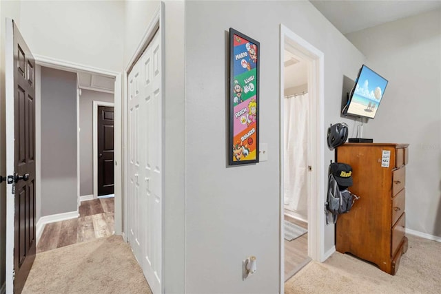 3350 Fox Hunt Dr, Palm Harbor, FL 34683 - hallway with light colored carpet and baseboards