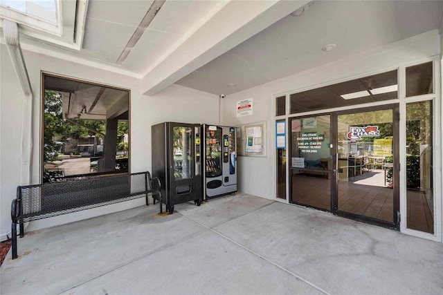 3350 Fox Hunt Dr, Palm Harbor, FL 34683 - view of exterior entry featuring stucco siding
