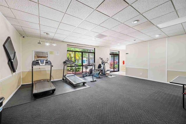 3350 Fox Hunt Dr, Palm Harbor, FL 34683 - exercise room with a drop ceiling and baseboards