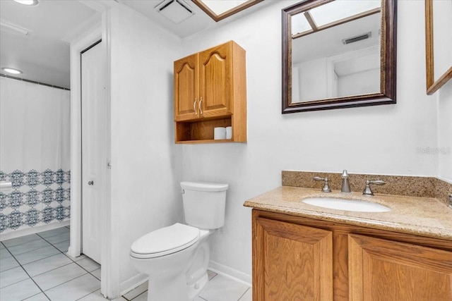 7811 Niagara Ave Unit 2125, Tampa, FL 33617 - bathroom featuring vanity, tile patterned floors, and curtained shower
