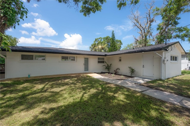 6108 Oak Ridge Ave, New Port Richey, FL 34653 - view of front of house with a front lawn