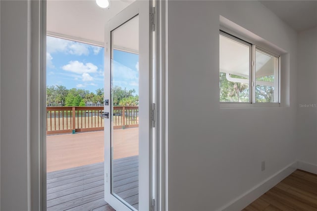 6108 Oak Ridge Ave, New Port Richey, FL 34653 - entryway featuring wood finished floors and baseboards