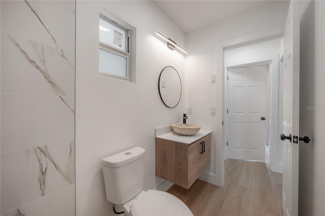 6108 Oak Ridge Ave, New Port Richey, FL 34653 - bathroom with vanity and wood finished floors