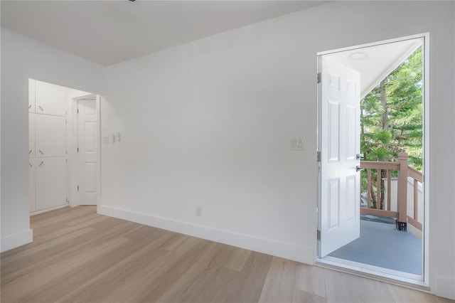 6108 Oak Ridge Ave, New Port Richey, FL 34653 - unfurnished room featuring light wood-style floors and baseboards