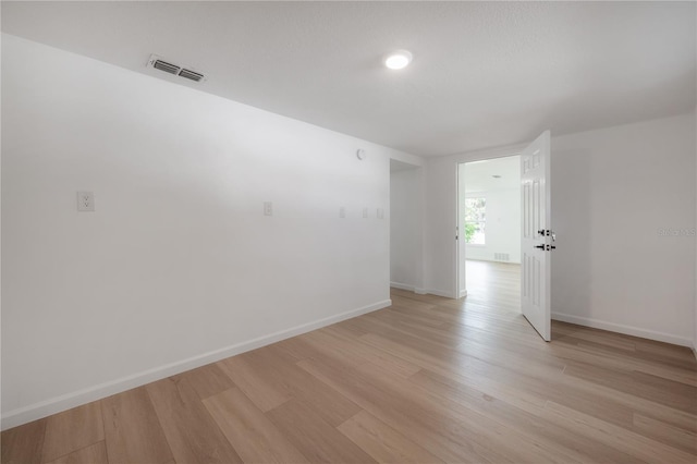 6108 Oak Ridge Ave, New Port Richey, FL 34653 - spare room featuring light wood-style floors