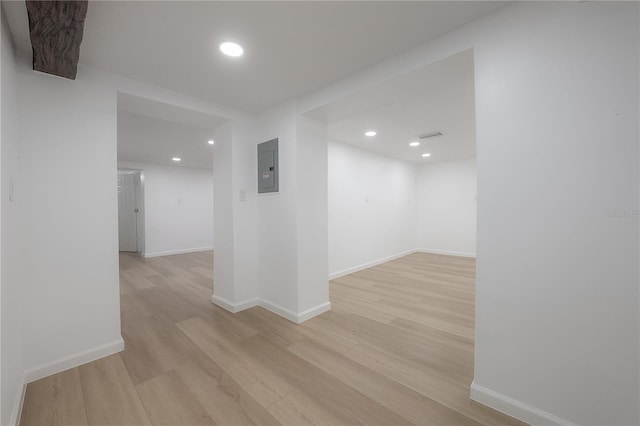 6108 Oak Ridge Ave, New Port Richey, FL 34653 - hall featuring light wood-style flooring, electric panel, and recessed lighting