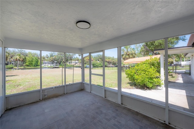6108 Oak Ridge Ave, New Port Richey, FL 34653 - unfurnished sunroom with healthy amount of natural light