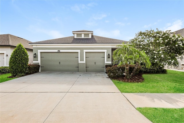 13408 Nimble Minke Unit 155E, Riverview, FL 33579 - view of front of house with an attached garage, driveway, stucco siding, a front lawn, and a shingled roof