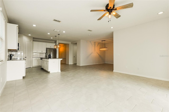 13408 Nimble Minke Unit 155E, Riverview, FL 33579 - unfurnished living room featuring recessed lighting and a ceiling fan