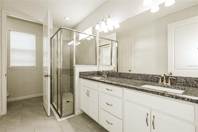 13408 Nimble Minke Unit 155E, Riverview, FL 33579 - full bathroom featuring a shower stall, double vanity, tile patterned flooring, and recessed lighting