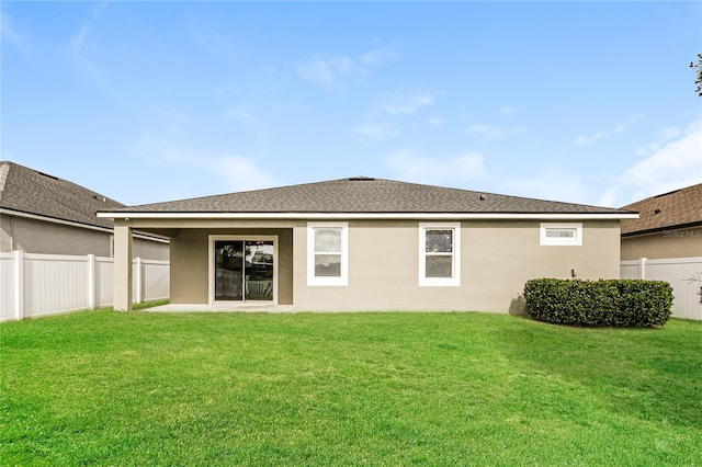 13408 Nimble Minke Unit 155E, Riverview, FL 33579 - rear view of property with stucco siding and roof with shingles