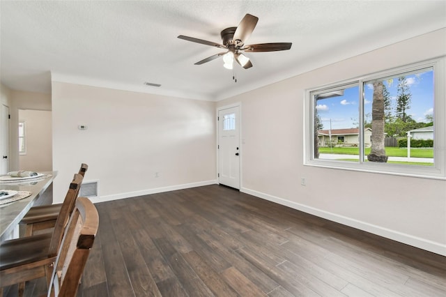 5934 51st Ave N, Kenneth City, FL 33709 - entryway with a ceiling fan and dark wood finished floors