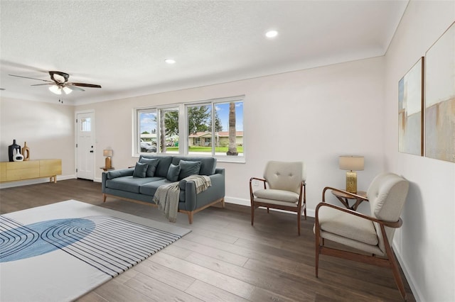 5934 51st Ave N, Kenneth City, FL 33709 - living room featuring wood finished floors, recessed lighting, a ceiling fan, and a textured ceiling