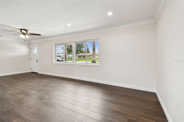 5934 51st Ave N, Kenneth City, FL 33709 - spare room featuring ceiling fan, dark wood finished floors, recessed lighting, and a textured ceiling