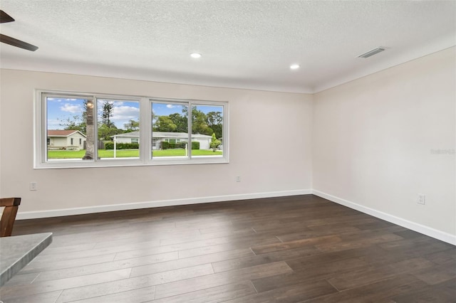 5934 51st Ave N, Kenneth City, FL 33709 - empty room featuring a textured ceiling, recessed lighting, dark wood-style floors, and ceiling fan