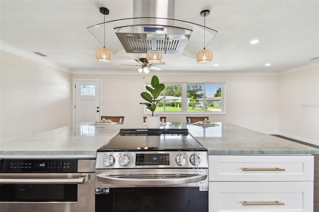 5934 51st Ave N, Kenneth City, FL 33709 - kitchen featuring appliances with stainless steel finishes, white cabinets, light stone countertops, range hood, and decorative light fixtures