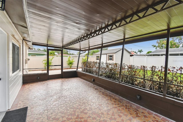 5934 51st Ave N, Kenneth City, FL 33709 - unfurnished sunroom with healthy amount of natural light