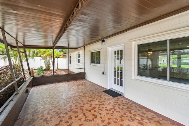 5934 51st Ave N, Kenneth City, FL 33709 - unfurnished sunroom with healthy amount of natural light
