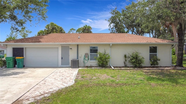 20352 Astoria Ave, Port Charlotte, FL 33952 - single story home featuring an attached garage, driveway, stucco siding, and a front yard