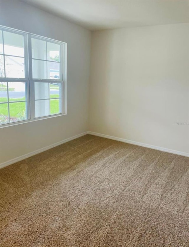 5543 Siltstone St, Lakeland, FL 33811 - empty room with carpet flooring and baseboards