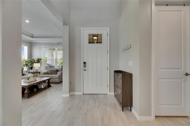 10399 Boyette Brook St, Riverview, FL 33569 - foyer entrance with light wood-style floors and ornamental molding