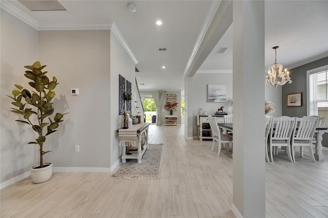 10399 Boyette Brook St, Riverview, FL 33569 - corridor featuring healthy amount of natural light, light wood-style floors, a chandelier, ornamental molding, and recessed lighting