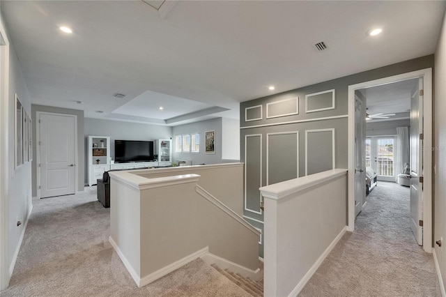 10399 Boyette Brook St, Riverview, FL 33569 - hall with an upstairs landing, light carpet, recessed lighting, and a raised ceiling