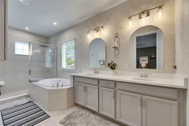 10399 Boyette Brook St, Riverview, FL 33569 - full bathroom featuring tiled shower, double vanity, a garden tub, tile patterned flooring, and wallpapered walls