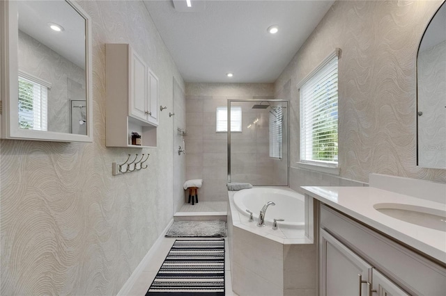 10399 Boyette Brook St, Riverview, FL 33569 - full bath with tiled shower, a bath, wallpapered walls, vanity, and recessed lighting