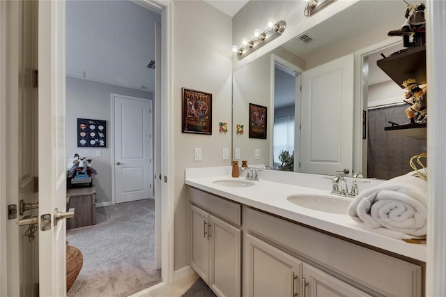 10399 Boyette Brook St, Riverview, FL 33569 - bathroom with double vanity and baseboards